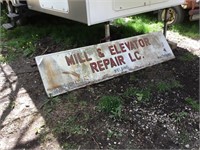 Mill & Elevator Repair LC sign, wooden frame.