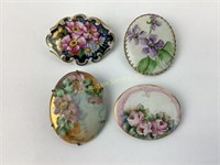 (4) old painted porcelain brooches