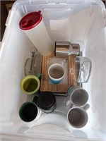 Tote of picture frames candle holders and coffee