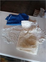 Box of doilies and tablecloths