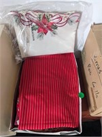 Box of Christmas decorations, tablecloths, oven