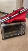 toaster oven and red bag