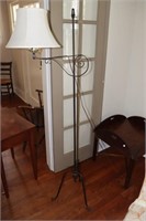 Wrought iron floor lamp and a wing back chair