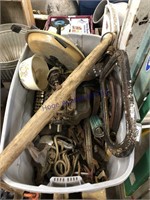 Gray tub of misc--iron, picture frames, evener