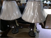 Pair of carved lamps with brand new shades and