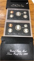 1996 and 1997 proof coin sets in cases. Both