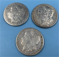 3 Morgan silver dollars 1889 O, 1897 O, 1884