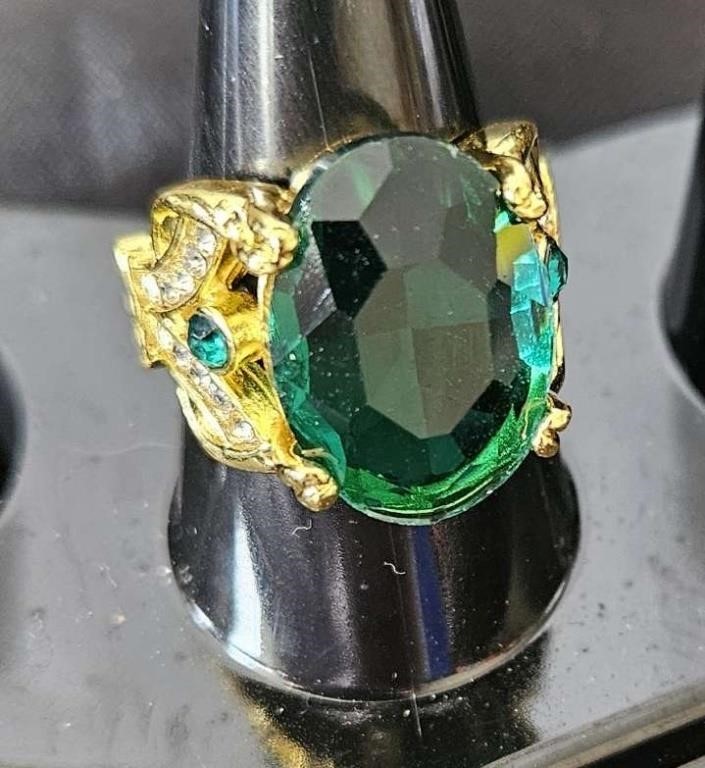 elegant ring with green stone