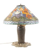 A Tiffany Style Stained Glass & Bronze Lamp
