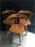 Three vintage very heavy wooden bar stools that