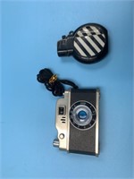 Camera lighter and a hand grenade lighter