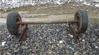 Trailer axle with springs