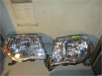 2 new headlights (Toyota Tacoma???)