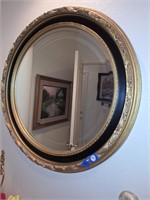 GOLD AND BLACK OVAL MIRROR