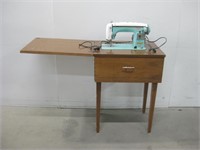 22"x 18"x 31" Sewing Machine In Table See Info