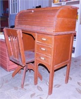Child's oak roll top desk and chair,