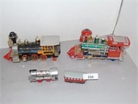 2 large trains, smaller train w car (tin)
