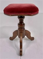 Piano stool, adjusts, walnut base, velvet seat has