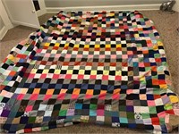 Beautiful checkered hand sewn quilt