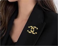 Chanel Vintage Black And Gold Brooch