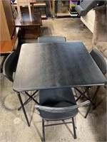 Cosco card table and four chairs****