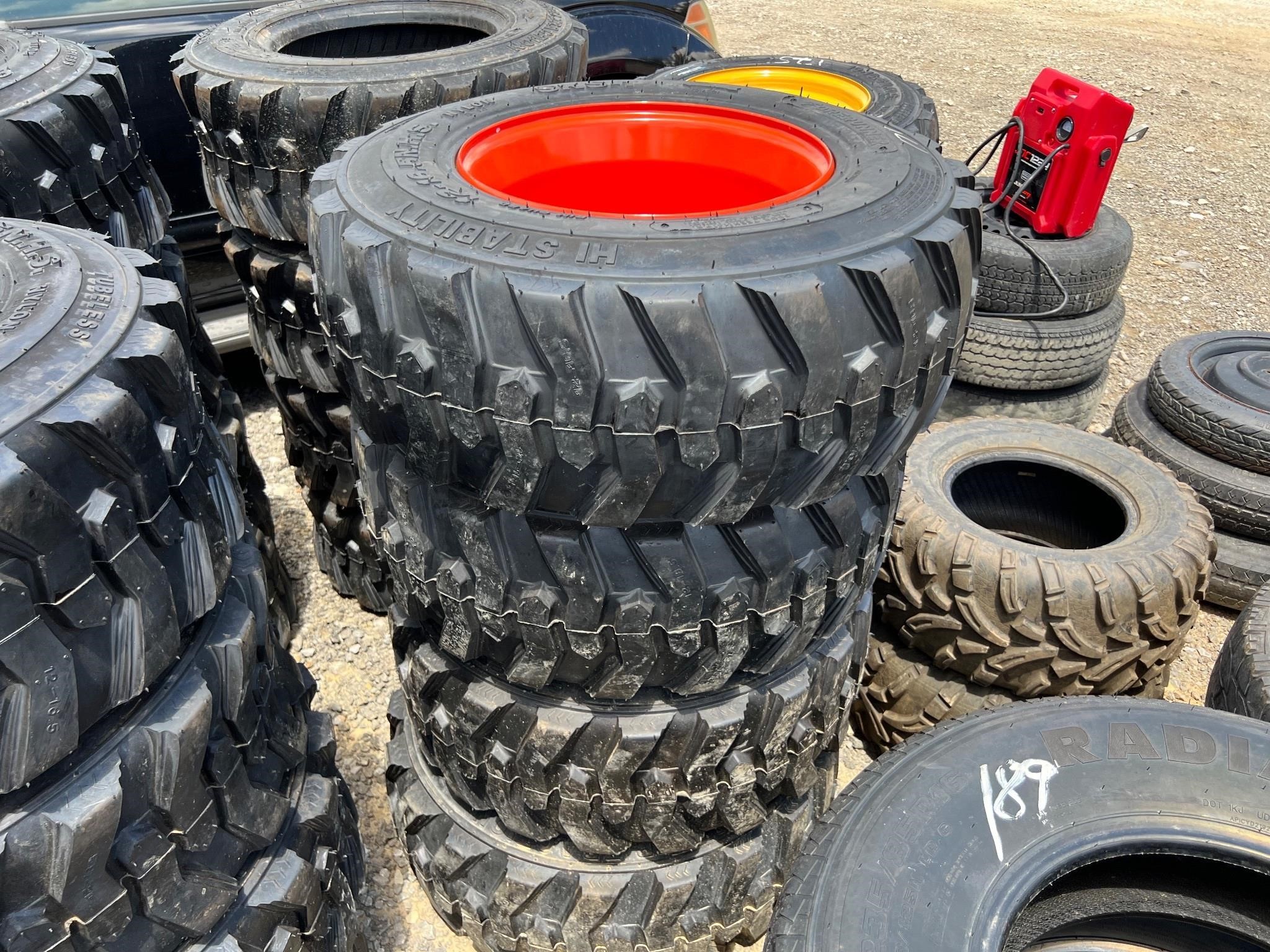 4 Unused 12-16.5 Skid Steer Tires on Wheels