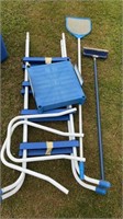Swimming pool ladders and gear . As is