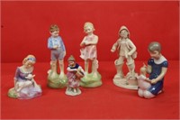 Group of 6 Figurines; Royal Doulton "She loves me