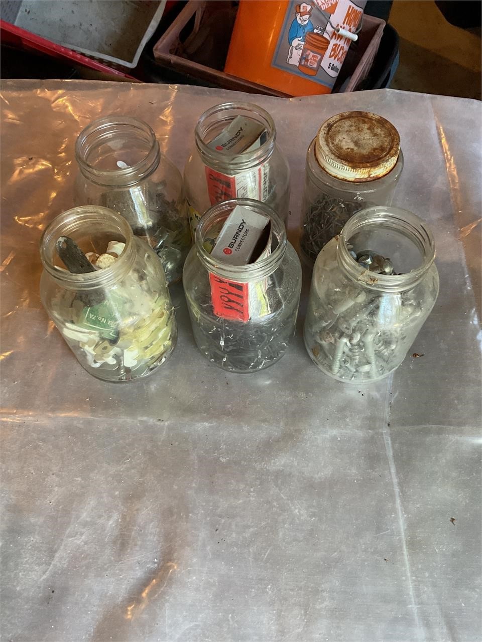 Vintage jars full of screws, nails etc