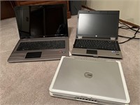 Laptops HP Dell , one has charger, turns on
