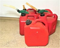Five Plastic Gas Cans