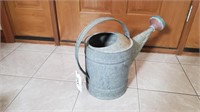 Watering can.