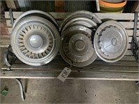8 assorted hubcaps