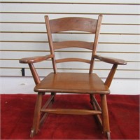 Vintage child's Walnut rocking chair.