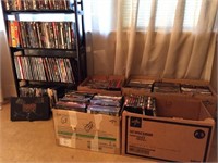 DVD rack, DVD movies, & 4-boxes of DVD movies