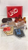 Misc game lot.  4 peg games.  Brand new 1983 Uno,