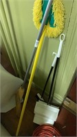 Lot with brooms, duster, and dust pan