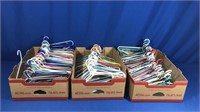 175+ PLASTIC HANGERS & 9 METAL SLACK HANGERS