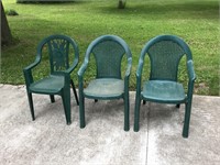 Three stackable lawn chairs