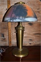 Brass 2 light table lamp with reverse painted shad