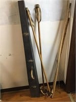 antique gun case and ski poles
