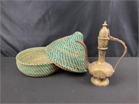 Moroccan Woven basket and brass teapot.