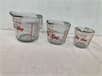Set of three Fireking glass measuring cups