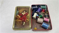 Wilkinâ€™s Red Boy tin with thread and thimbles