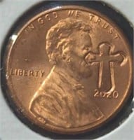 crucifix stamped Lincoln. Penny