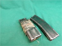 3, M1 magazines with ammo. 2 are taped together.