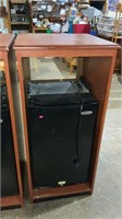 Wooden cabinet with refrigerator