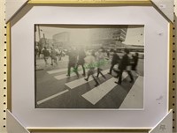 Gold framed print of a 1960s photograph of a