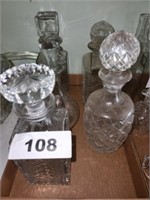 SEVERAL GLASS DECANTERS
