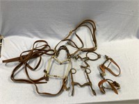 Box of equestrian accessories, including spurs, bi